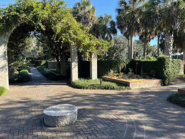 Millstone and arbor at Brookgreen Gardens